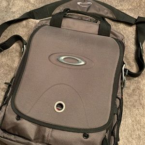 Oakley computer sling bag.
